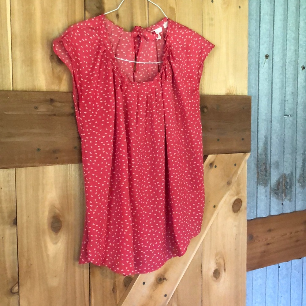 Pink and white flowy top.Lauren Conrad